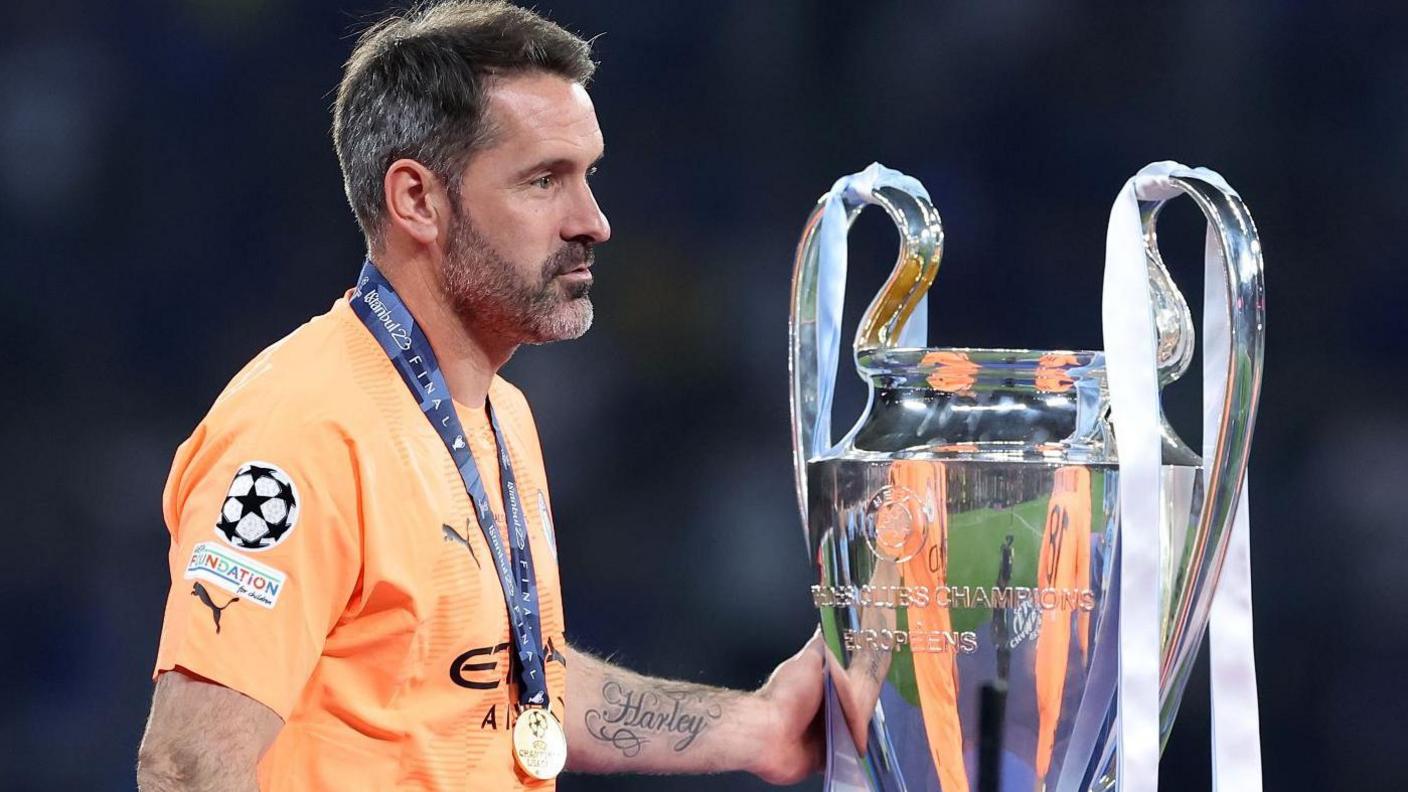 Man City cult hero keeper Carson retires at 40