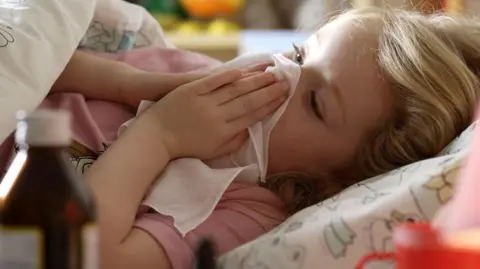 Parents urged to vaccinate children over half-term as flu cases rise
